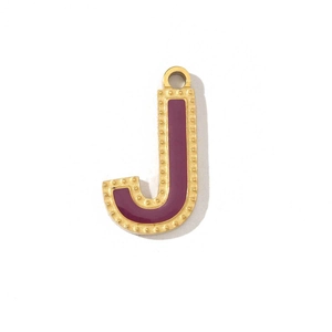 Detailed view of golden letter J pendant with purple enamel and dotted border decor