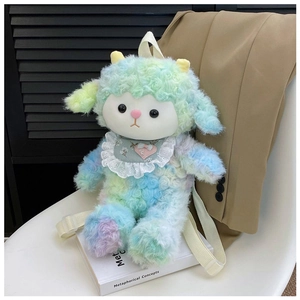 Close-up of curly rainbow plush sheep bag with adjustable cream straps on white chair