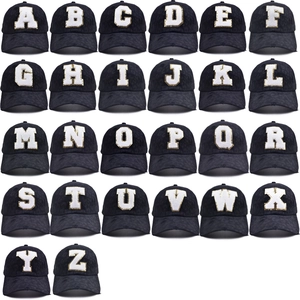 Distressed black baseball caps featuring white sequin alphabet letters A-Z embroidery