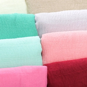 Solid color pleated cotton linen scarf with frayed edges available in various soft colors