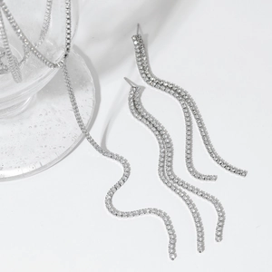 Minimalist silver Y-shaped tassel necklace and earrings set with shimmering zircon crystals
