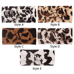 Set of 5 soft elastic leopard and cow print baby headbands with large bows