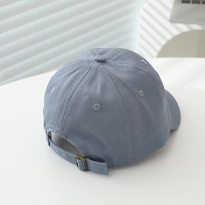 Detailed back view of a grey-blue baby baseball cap with bronze metal buckle and eyelets