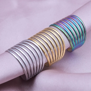 Three-color minimalist multilayer open stainless steel rings on premium satin fabric