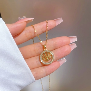 Gold evil eye necklace with pavé cubic zirconia and dainty chain for luxury look