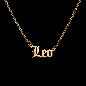 Detail of gothic Leo zodiac pendant necklace in polished 18K gold plated stainless steel