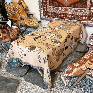 Bohemian mushroom pattern woven camping blanket with tassels on stones