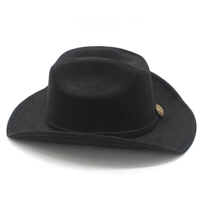 Close-up of black suede cowboy hat featuring a vintage gold metal emblem detail