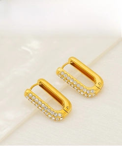 Detailed close-up of 18K gold plated stainless steel rectangle hoops with zircon pavé