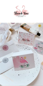 Pink greeting card set with flamingo motifs, thank you card, and elegant gift box