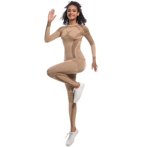 Close-up of khaki ribbed athletic bodysuit with elastic knit texture and slim fit design