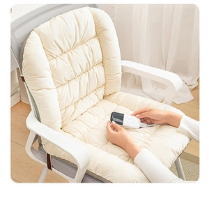 Detail of heated plush chair cushion in ivory white with integrated corded remote control