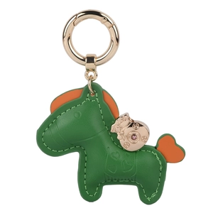 Creative green leather pony keychain with orange trim and golden money bag charm pendant