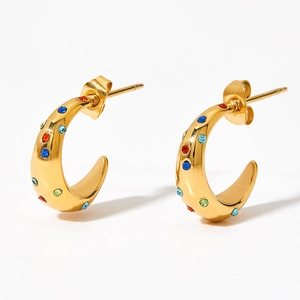 Chic gold C-shape hoop earrings with colorful zircon stones on a white background