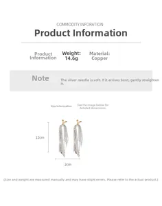Detail view of 18k gold plated long tassel earrings showing copper and silver needle material