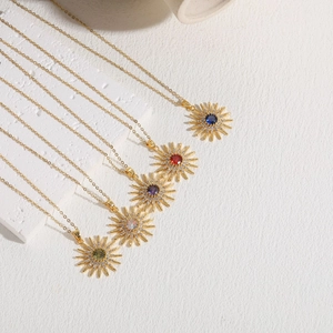 Luxury 14K gold plated sunflower necklaces with colorful zircon stones on white stone
