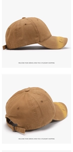 Detail view of washed cotton baseball cap in tan with LONG embroidery and metal buckle