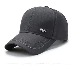 Detail of dark gray baseball cap with LUO OU embroidery and metallic side brand plate