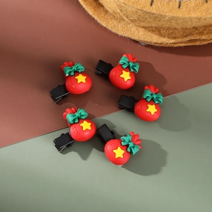 Set of five cute red plush hair clips with green bows and stars on duckbill clips