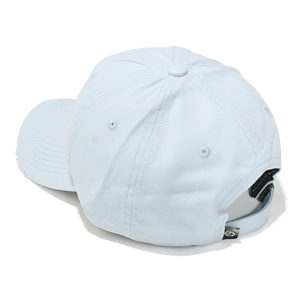 Detail view of adjustable back strap and woven logo on light blue cotton baseball cap