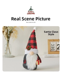 Detailed view of a Santa Claus gnome figure with a plaid hat and a gold gift box