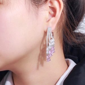 Elegant multi-layer tassel earrings with pink pear-cut zircons on a silver base