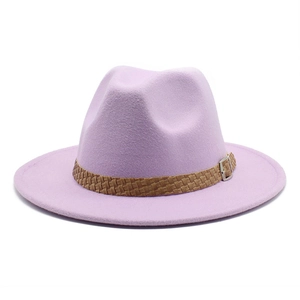 Detail of lavender wool fedora hat featuring a brown braided leather band and metal buckle