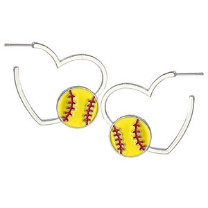 Detail view of heart-shaped hoop earrings with yellow baseball themed charms in silver metal