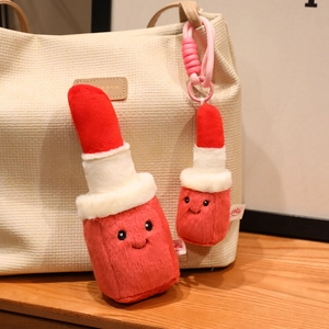 Cute plush lipstick dolls in large and small sizes with smiling faces and metal hooks