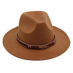 Detail of caramel wool felt fedora with woven bead band and golden feather pendant charm
