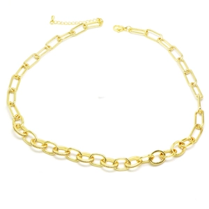 Macro view of gold plated paperclip chain with zircon pavé links and adjustable clasp