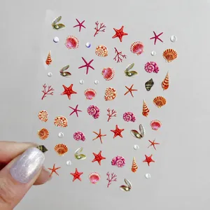 3D embossed sea life nail stickers featuring colorful starfish, shells and coral patterns