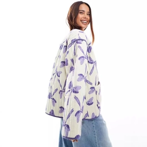 Women's cream quilted jacket with purple bow print and loose fit style