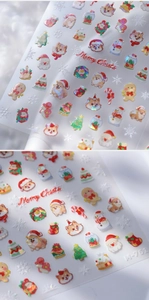 Detail showing 3D frosted Christmas nail stickers with Santa Claus and gingerbread men