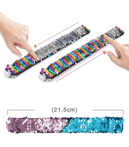 Detail view of 21.5cm mermaid sequin slap bracelet showing reversible color-changing effect