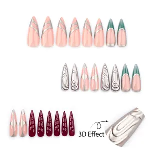 Faux ongles stiletto punk 3D argentés avec texture métallique et style French y2k