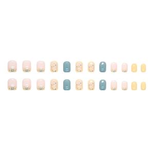 Macro detail of short square nails with floral prints and colorful polka dots