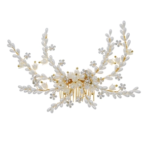 Exquisite bridal hair comb with pearls and rhinestones on a gold wire floral design