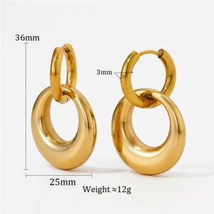 Detailed macro view showing dimensions of double hoop earrings in polished gold finish