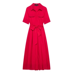 Detail of red short sleeve poplin shirt dress featuring chest pockets and belted waist bow
