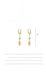Detailed view of Baroque pearl earrings with S925 silver hooks and 18K gold finish