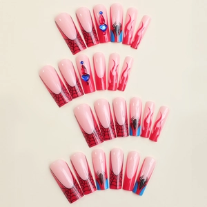 French spider web press-on nails with red flame gradient and rhinestone accents in XXL length