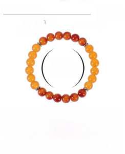 Detail view of 8mm citrine and agate beaded bracelet showing dimensions and parameters