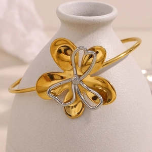 Two-tone 18K gold plated stainless steel open bangle with layered flower design