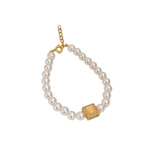18k gold plated pearl necklace featuring an irregular square peach gemstone pendant