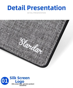 Detail view of Slardar logo printed on grey textured canvas fabric wallet with black edges
