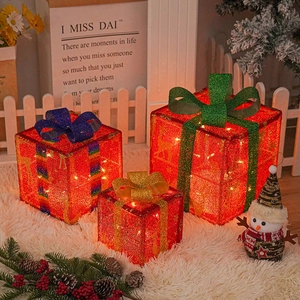 Three-piece glowing Christmas gift box set with metal reindeer patterns and snowman decor