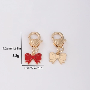 DIY summer dessert alloy keychains with red and beige bows and golden heart clips