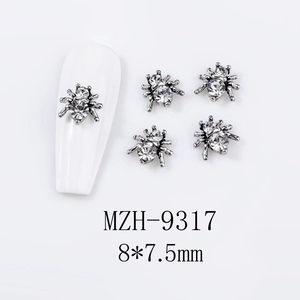Detailed view of silver alloy spider nail charms with rhinestones, size 8x7.5mm