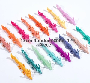 Detailed top view of 13cm 3D printed articulated dragons in various vibrant colors